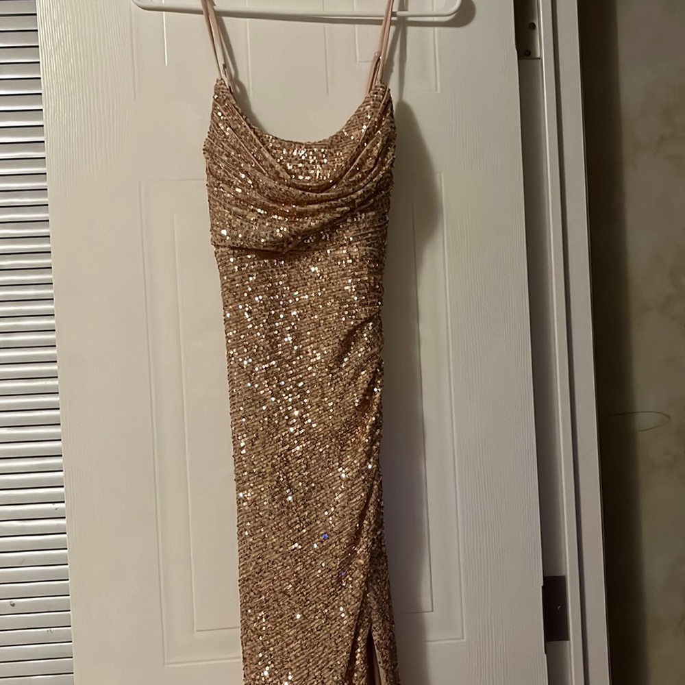 A gold glitter dress (with slit)